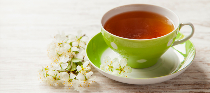 Cup of tea with flowers