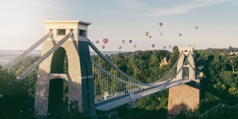 Bristol Suspension Bridge with air balloons in the distance behind
