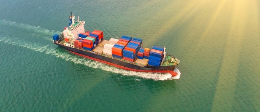 Large shipment boat sailing across the ocean